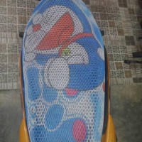 sarung jok motor doraemon uk.L