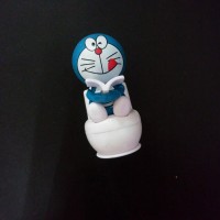 Jual SWING DOLL DORAEMON BACA BUKU Boneka Goyang Aksesoris Dashboard Mobil Murah