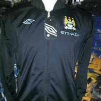 JAKET MANCHESTER CITY HITAM GRADE ORI UMBRO BAGUS KEREN MURAH GROSIR E
