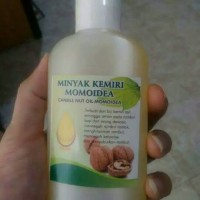 minyak kemiri momoidea