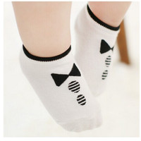 Jual T BEST PROMO kaos kaki anak gambar dasi kupu-kupu dan kancing hitam pu Murah
