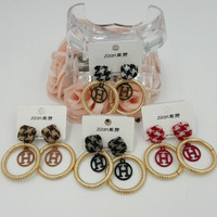 Anting HM branded golden ring fashioned