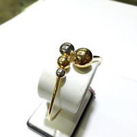 Gelang bulat emas kuning 70% berat 6.35 gram diameter 5.7cm kombinasi