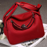 TAS HERMES LINDY KULIT JERUK 7-111-8