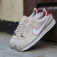 cream nike cortez