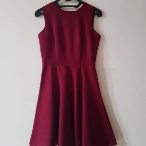Arithalia red dress