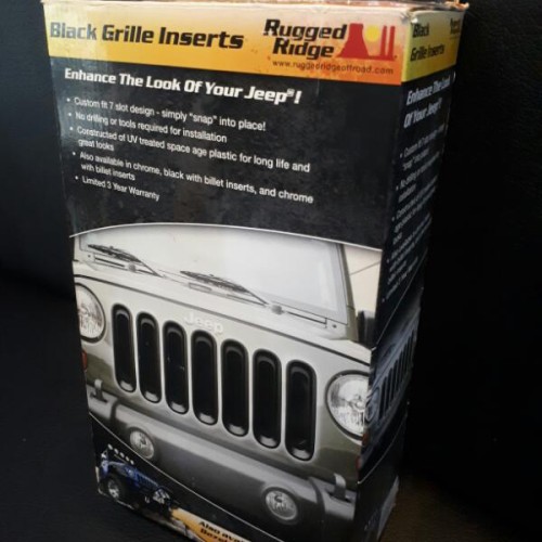 Foto Produk Bezel Grille Insert Black Rugged Ridge For Jeep JK Wrangler dari PIONIR JEEP