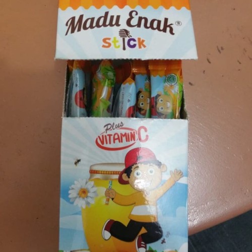 Foto Produk Madu Enak Stick Plus Vitamin C 1 Kotak 20 Stick Rasa Jeruk dari ToserbaGrosirOlshop