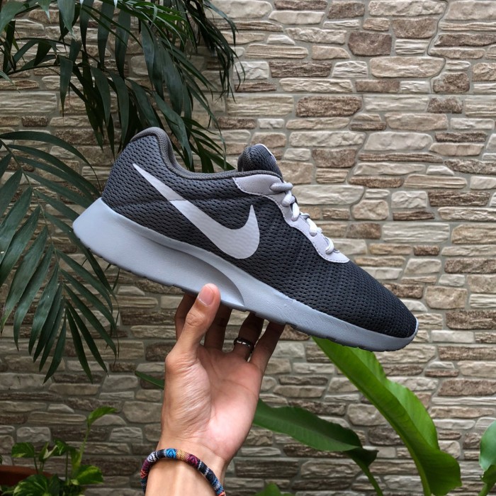 grey nike tanjun trainers