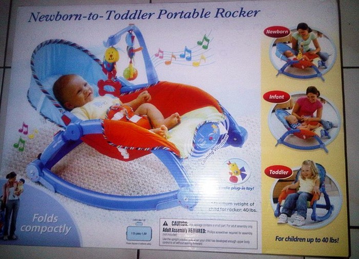 baby sleeping in fisher price rocker