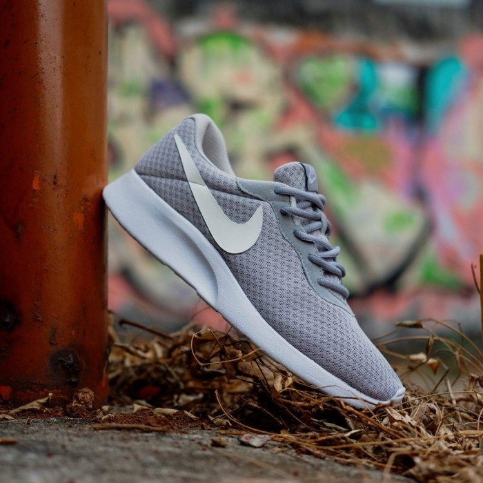 grey nike tanjun trainers