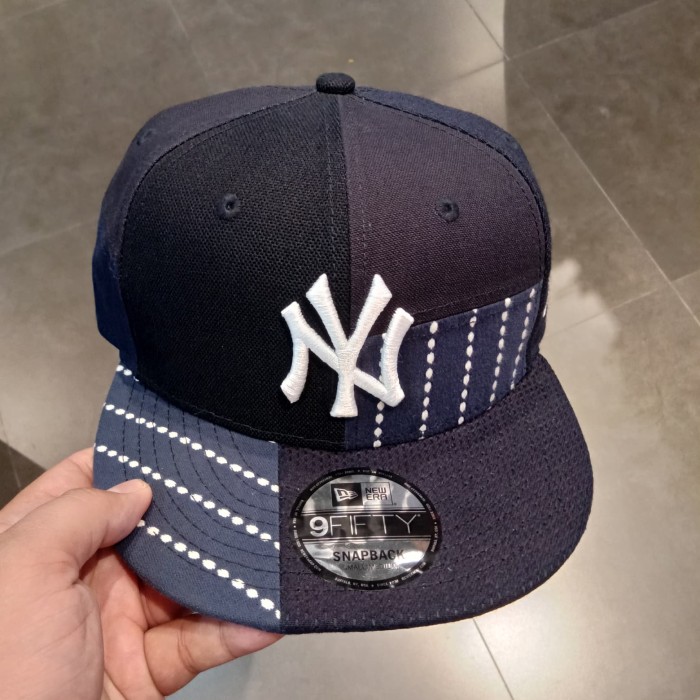 new era cap harga