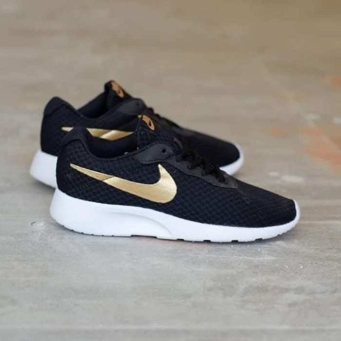 nike tanjun black gold original