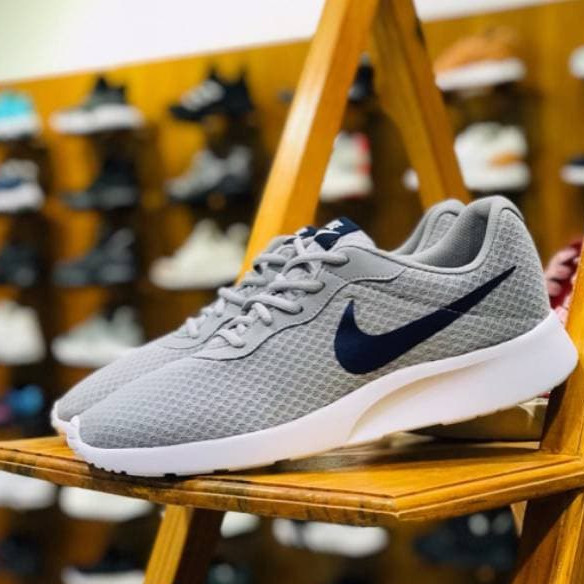 grey nike tanjun trainers