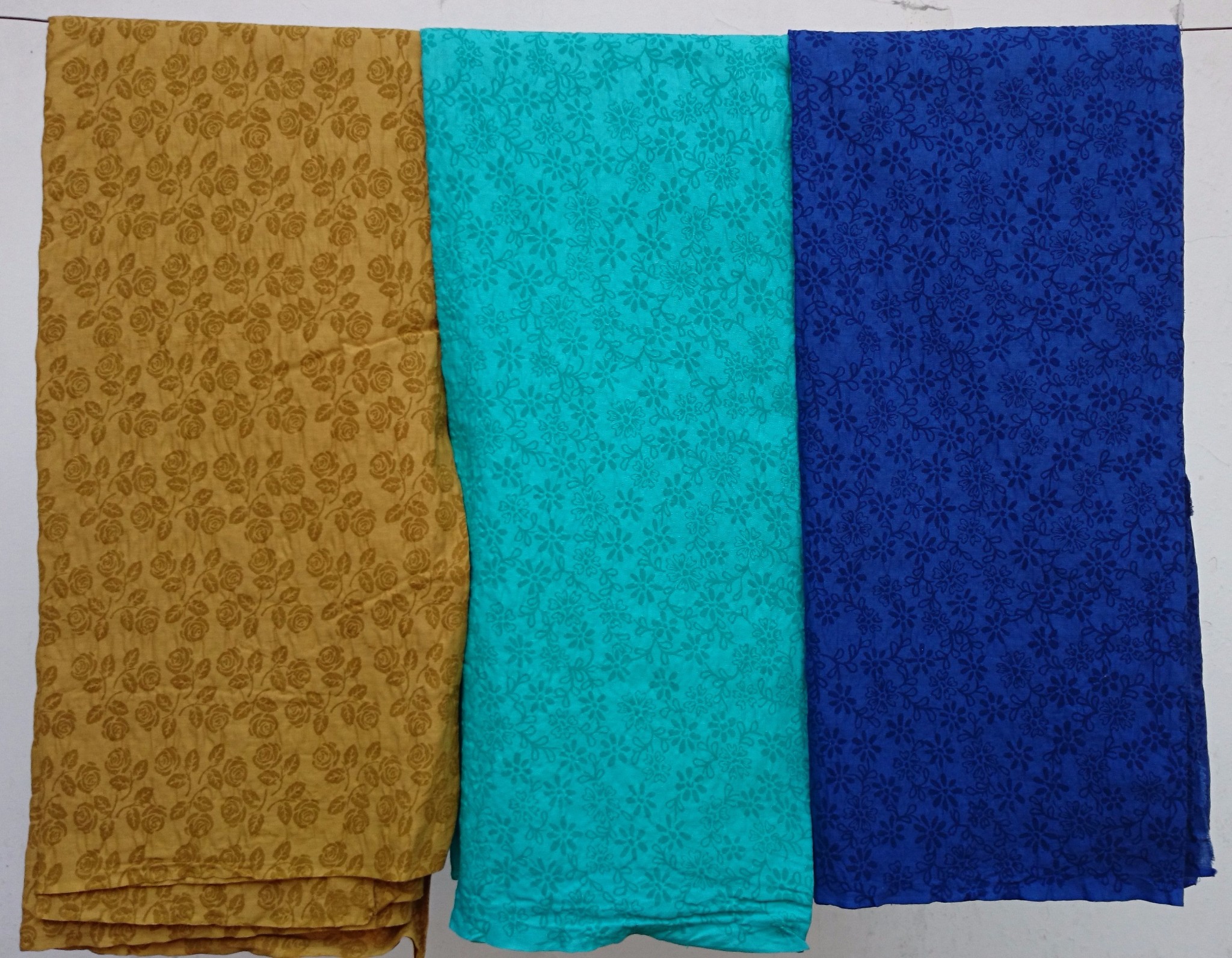 Jual Kain Batik Embos Katun Warna Coklat Gelap Gold Biru Lautdan